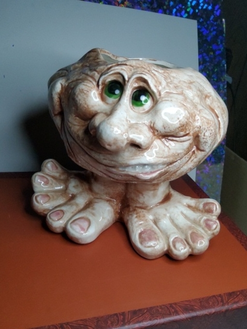 Whimsical Face Planter Green Eyes Protuding Toes.